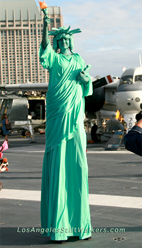 stilt walker statue of liberty